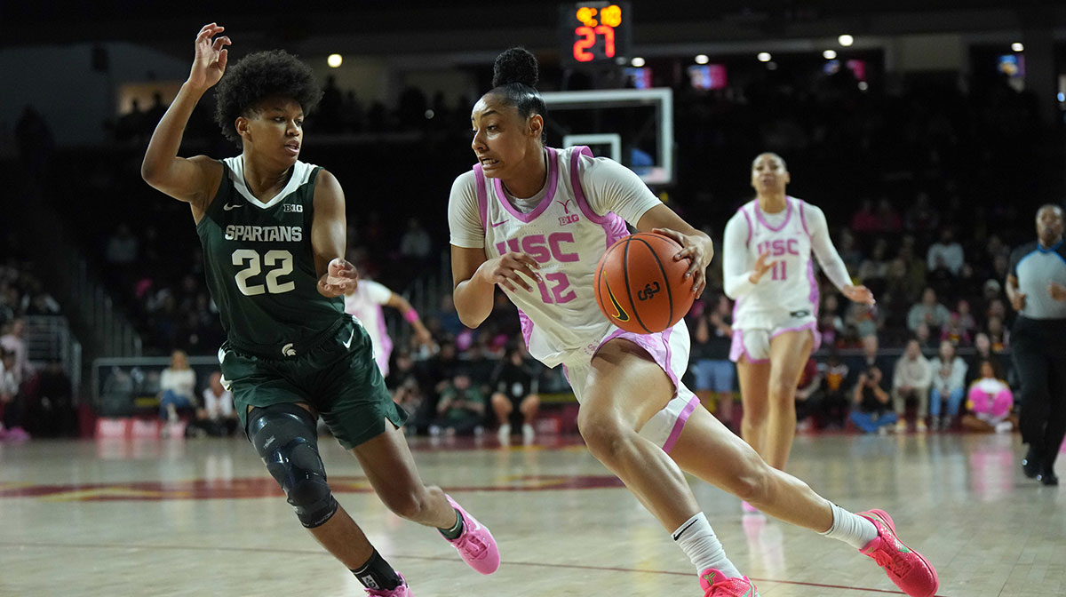 Southern California Trojans guard JuJu Watkins (12) dribbles the ball against Michigan State Spartans guard Nyla Hampton (22) in the first half.