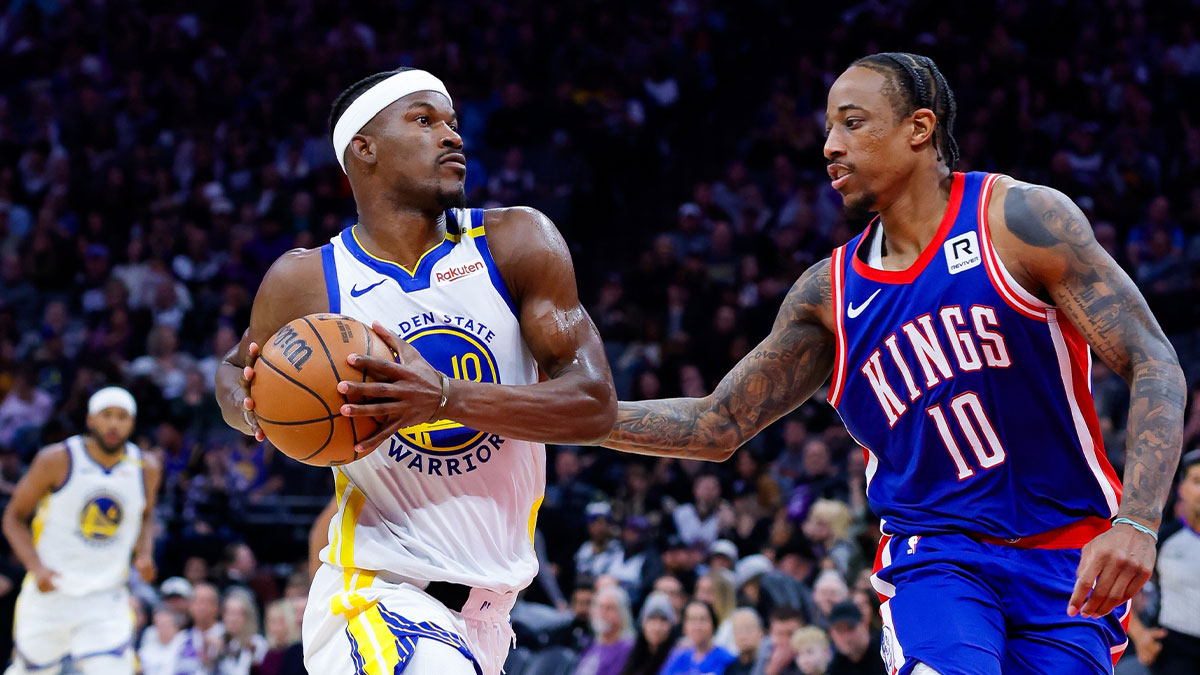 Warriors forward Jimmy Butler III (10) drives to the basket