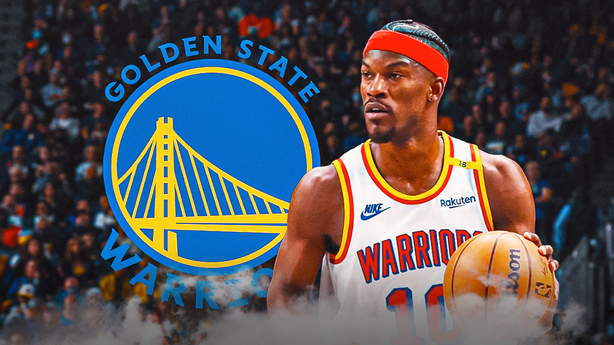 Jimmy Butler in Warriors gear. Warriors logo in the background.