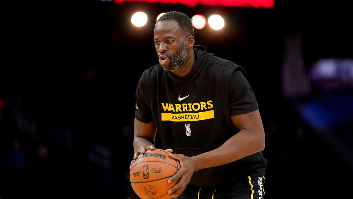 Warriors ahead Draimond Green (23) is heated before the game against Charlotte Hornet on Chase Center