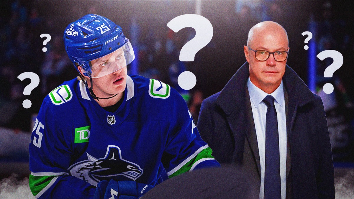 Elias Pettersson on the left, Canucks GM Patrik Allvin on the right, inside Rogers Arena