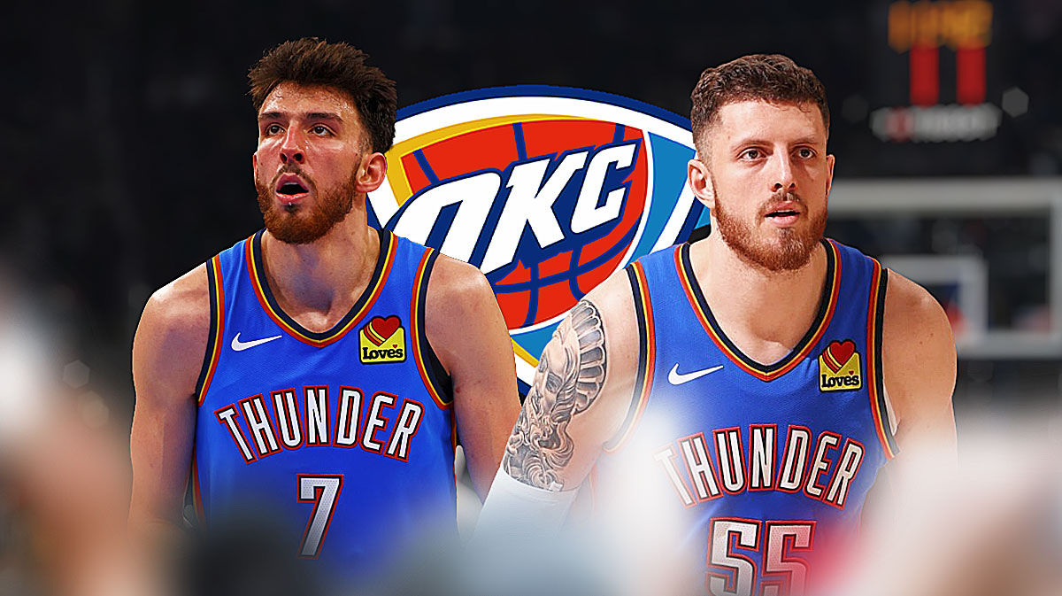 Thunder forward Chet Holmgren next to Thunder center Isaiah Hartenstein with the Thunder logo in the background