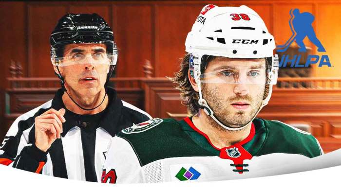 Inside of a court room, with an NHL referee calling a penalty on the right, Ryan Hartman on the left with an NHLPA logo next to him