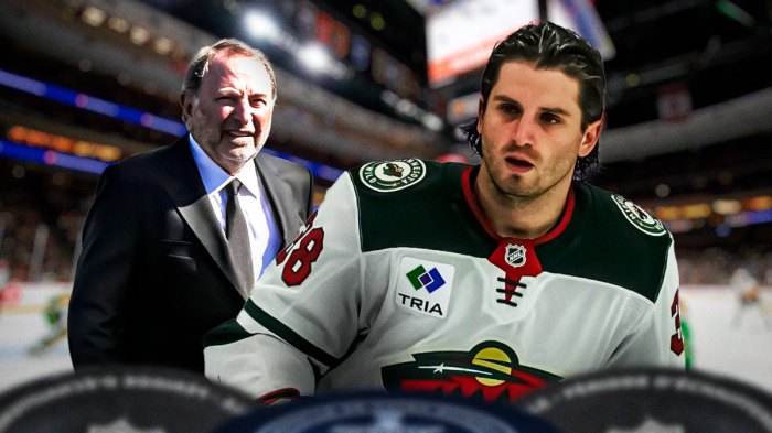 Photo: Ryan Hartman in action in Wild jersey, Gary Bettman beside him