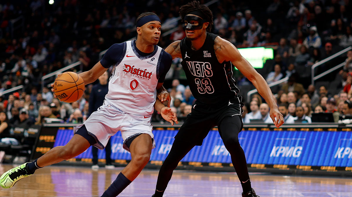 Washington Wizards guard Bilal Coulibaly (0) drives to the basket as Brooklyn Nets center Nic Claxton (33) defends in the second half at Capital One Arena. 