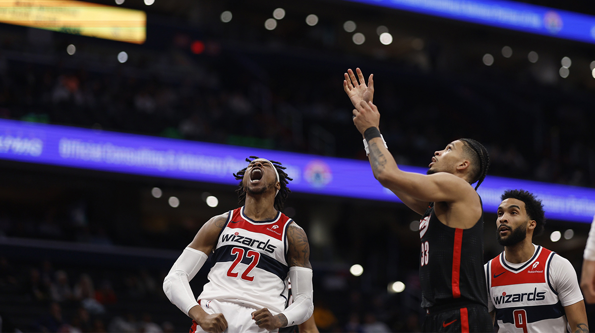 Washington Wizards guard Bilal Coulibaly (0) drives to the basket as Brooklyn Nets center Nic Claxton (33) defends in the second half at Capital One Arena.