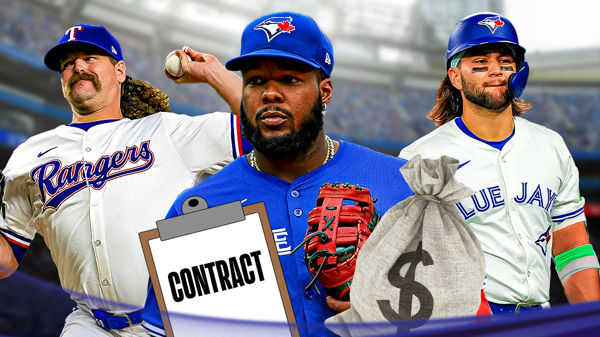 Vladimir Guerrero Jr. with a bag of money and a contract standing next to Andrew Chafin and Bo Bichette