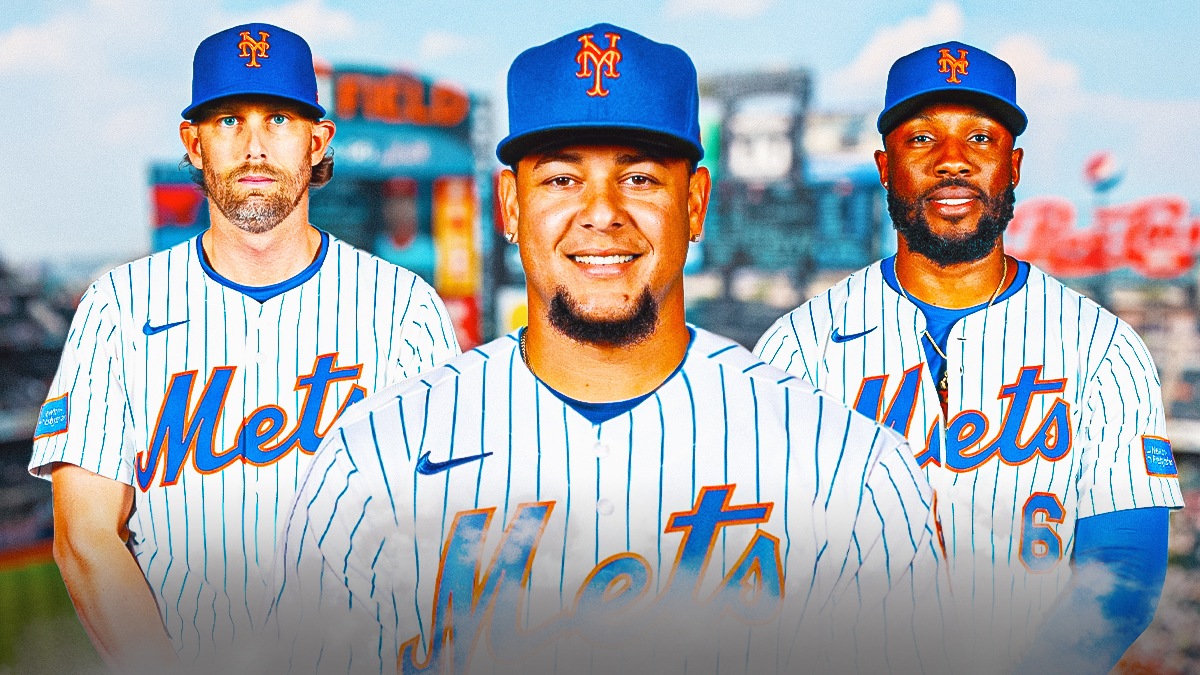 Luis Castillo in a Mets uniform standing next to Starling Marte and Jeff McNeil