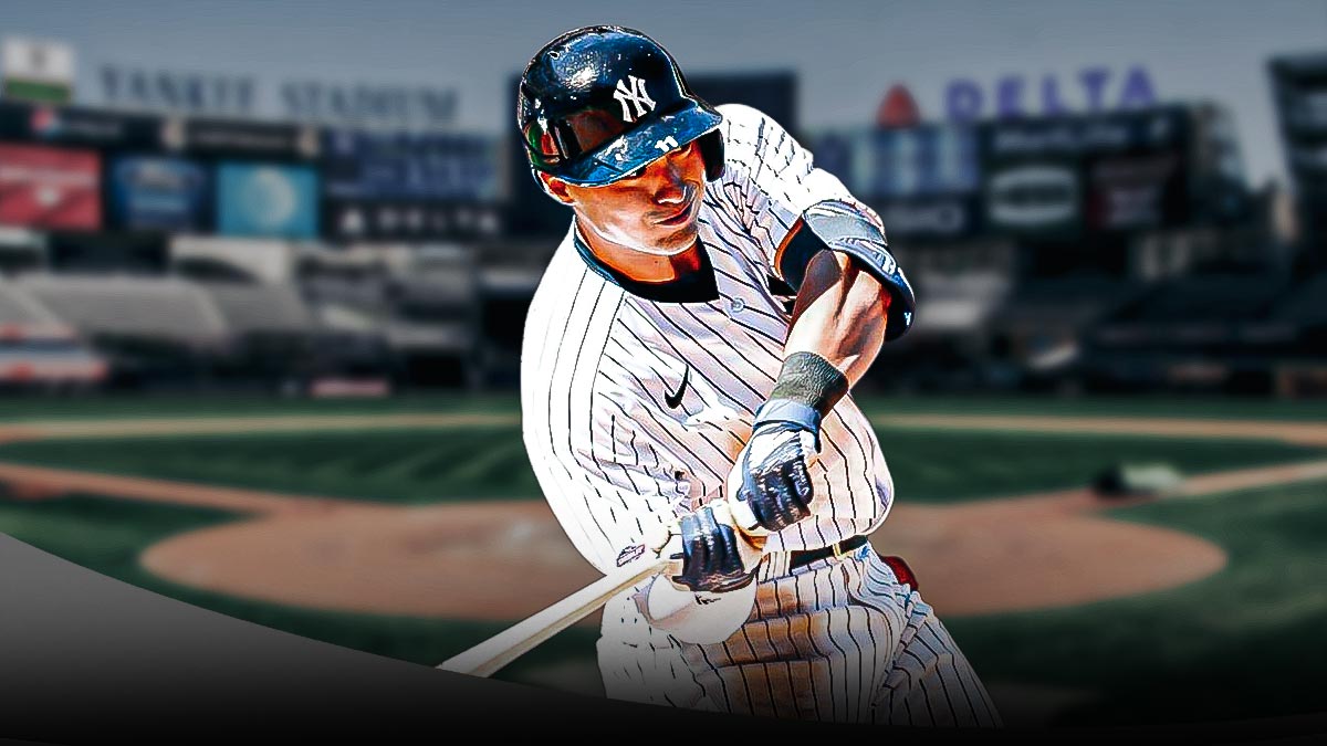 Yankees shortstop Anthony Volpe swinging the bat at Yankee Stadium