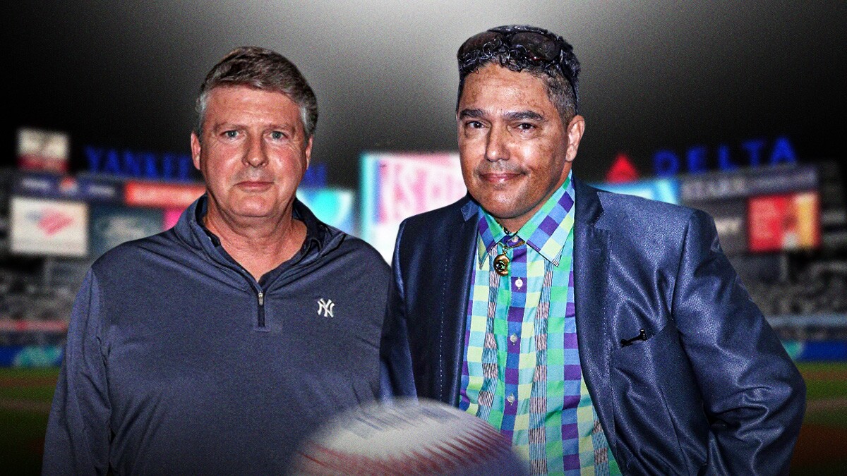 Nick Turturro next to Yankees executive Hal Steinbrenner in front of Yankee Stadium.