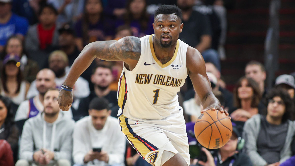 New Orleans Pelicans forward Zion Williamson (1) dribbles against the Phoenix Suns in the second quarter at Footprint Center.