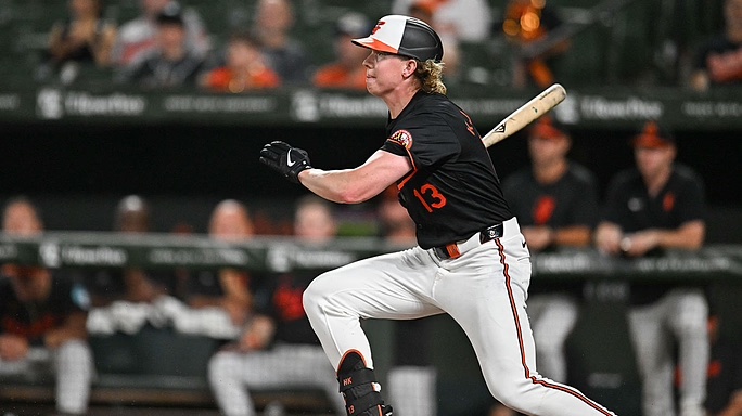 Baltimore Orioles outfielder Heston Kjerstad (13) hits a single during the seventh inning against the Toronto Blue Jays at Oriole Park at Camden Yards.