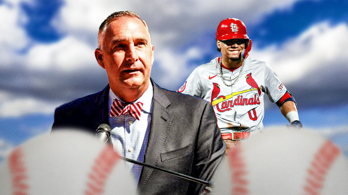 St. Louis Cardinals star Nolan Arenado and John Mozeliak in front of Busch Stadium.