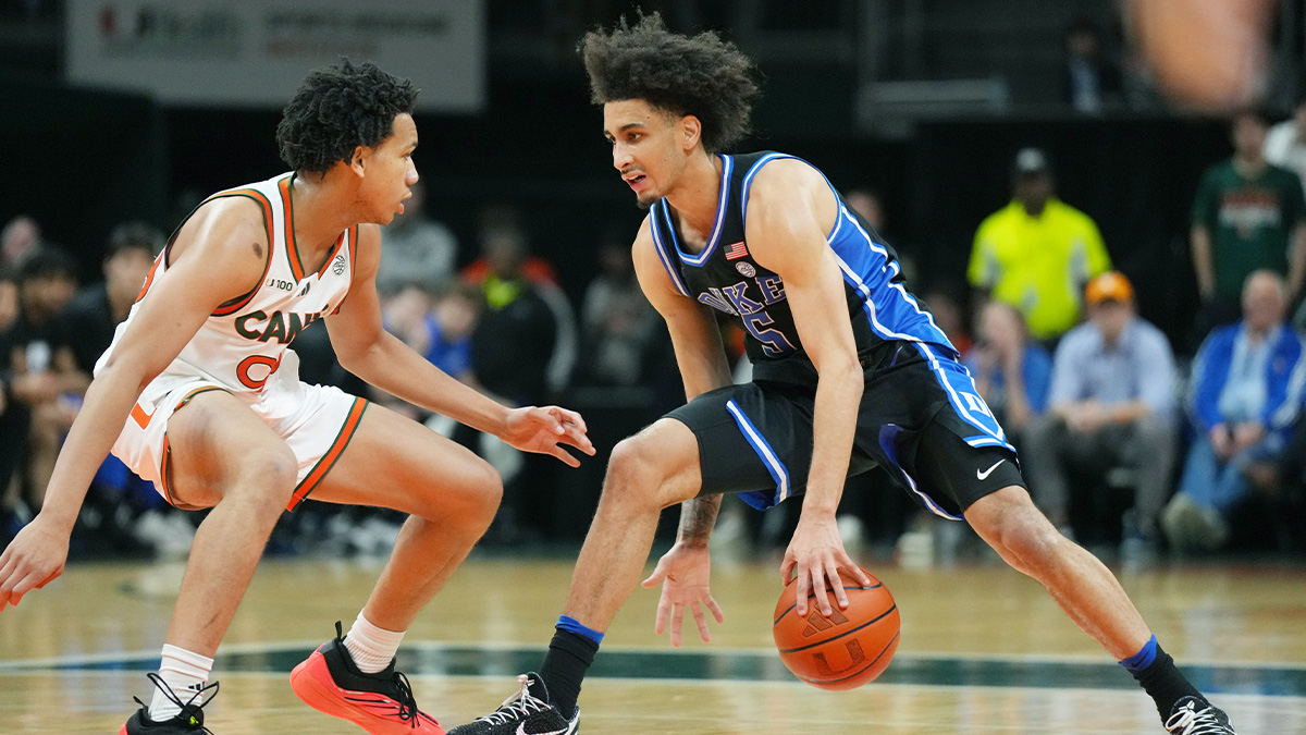 Duke Blue Devils guard Tyrese Proctor (5) drives up the court as Miami (Fl) Hurricanes guard Divine Ugochukwu (99) defends during the first half at Watsco Center.