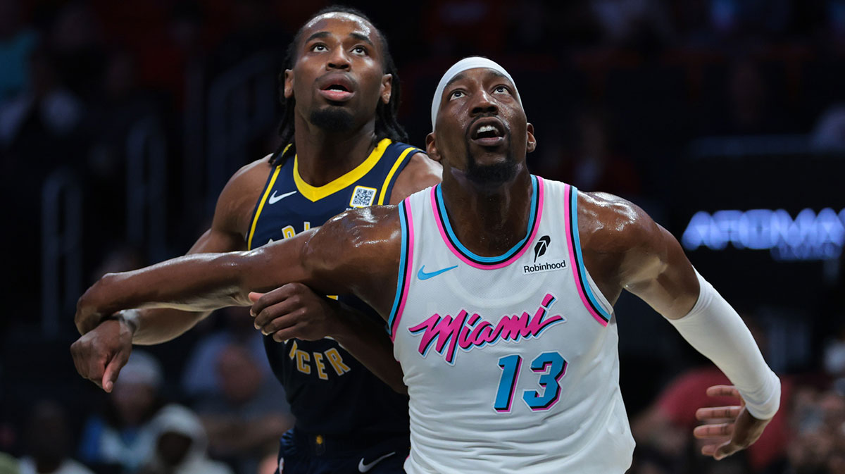  Miami Heat center Bam Adebayo (13) guards Indiana Pacers forward Aaron Nesmith (23) during the first quarter at Kaseya Center. 