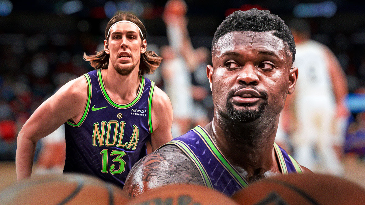 Pelicans F Zion Williamson next to F Kelly Olynyk