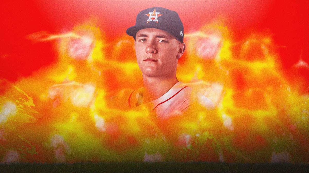 Astros pitcher Hunter Brown with fire in background