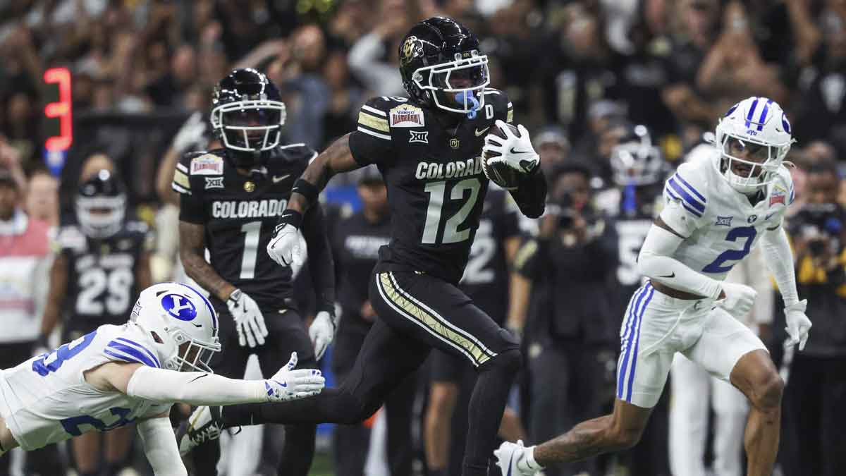 Colorado Buffaloes wide receiver Travis Hunter (12) runs with the ball during the second quarter against the Brigham Young Cougars at Alamodome.