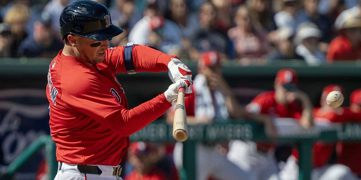 Boston Red Sox infielder Alex Bregman (2) connects with the ball for a double in the fourth inning of their game against the Toronto Blue Jays at JetBlue Park at Fenway South. 