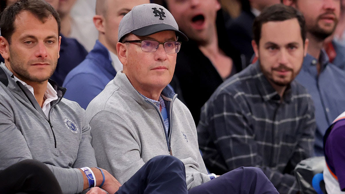 New York Mets owner Steve Cohen sits courtside during the third quarter between the New York Knicks and the Toronto Raptors at Madison Square Garden. 