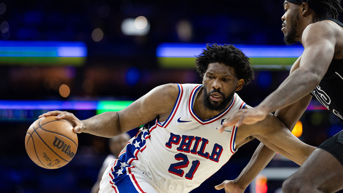 Philadelphia 76ers center Joel Embiid (21) controls the ball against Brooklyn Nets center Day'Ron Sharpe (20) during the third quarter at Wells Fargo Center.