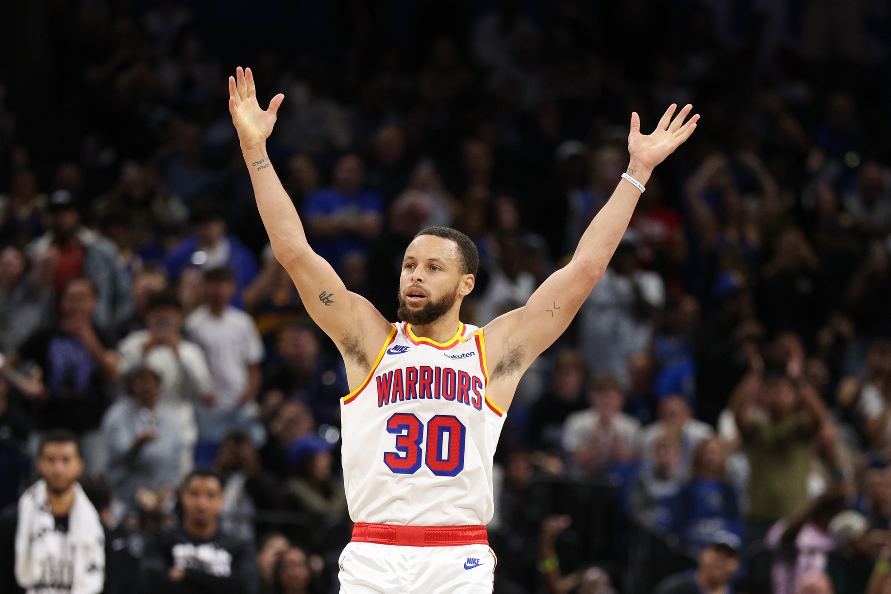 Golden State Warriors guard Stephen Curry (30) celebrates after a basket against the Orlando Magic in the fourth quarter at Kia Center. 