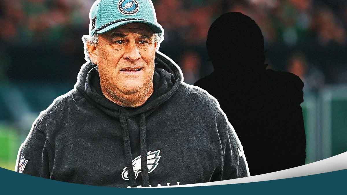 Vic Fangio next to the blacked-out silhouette of Baron Browning at the Eagles stadium