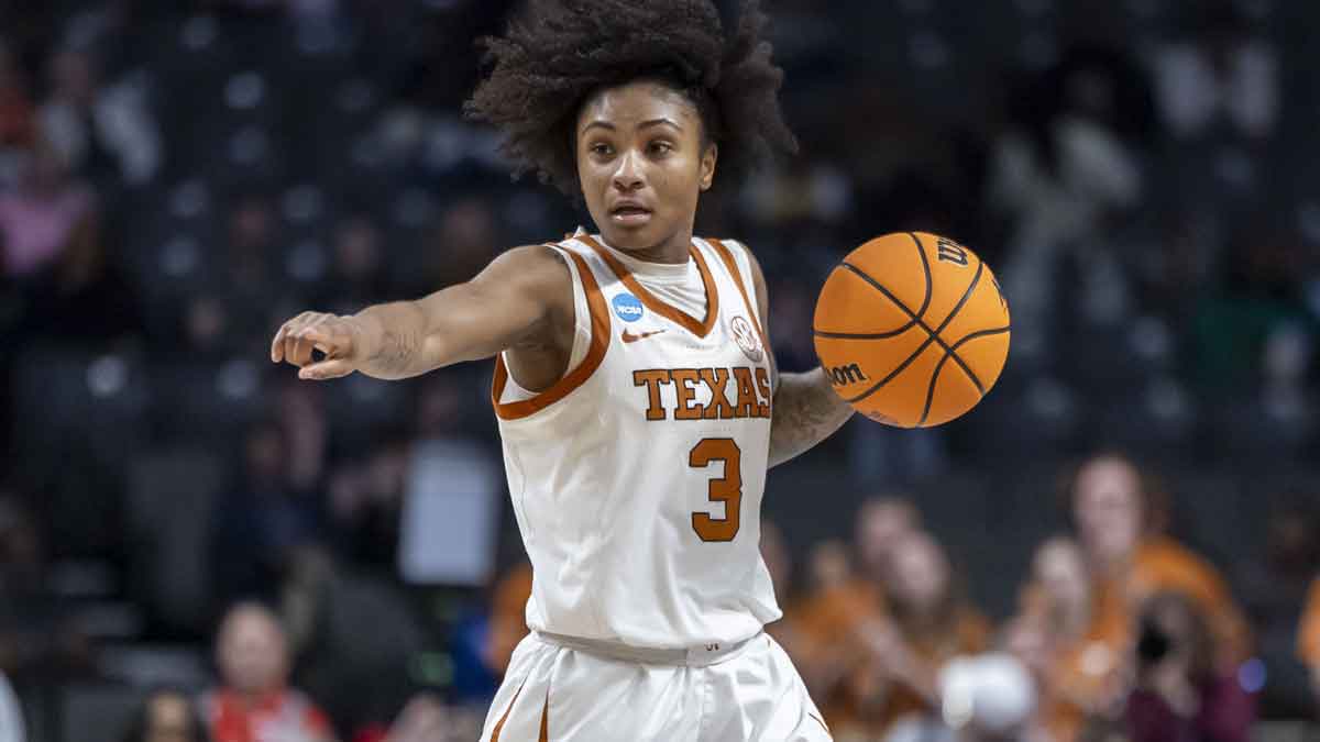 Texas Longhorns guard Rori Harmon (3) runs the offense against the TCU Horned Frogs during the first half of an Elite 8 NCAA Tournament basketball game at Legacy Arena.