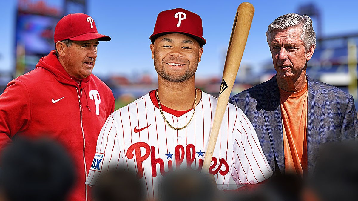 Philadelphia Phillies outfielder Justin Crawford in center, Philadelphia Phillies manager Rob Thomson on left side, Philadelphia Phillies president of baseball operations Dave Dombrowski on right side, Citizens Bank Park (home stadium of the Philadelphia Phillies) in background