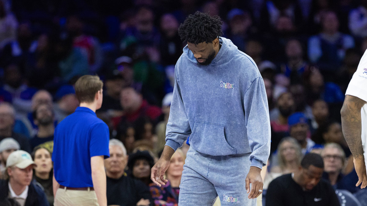 Injured Philadelphia 76ers center Joel Embiid during a timeout in the fourth quarter against the Golden State Warriors at Wells Fargo Center.