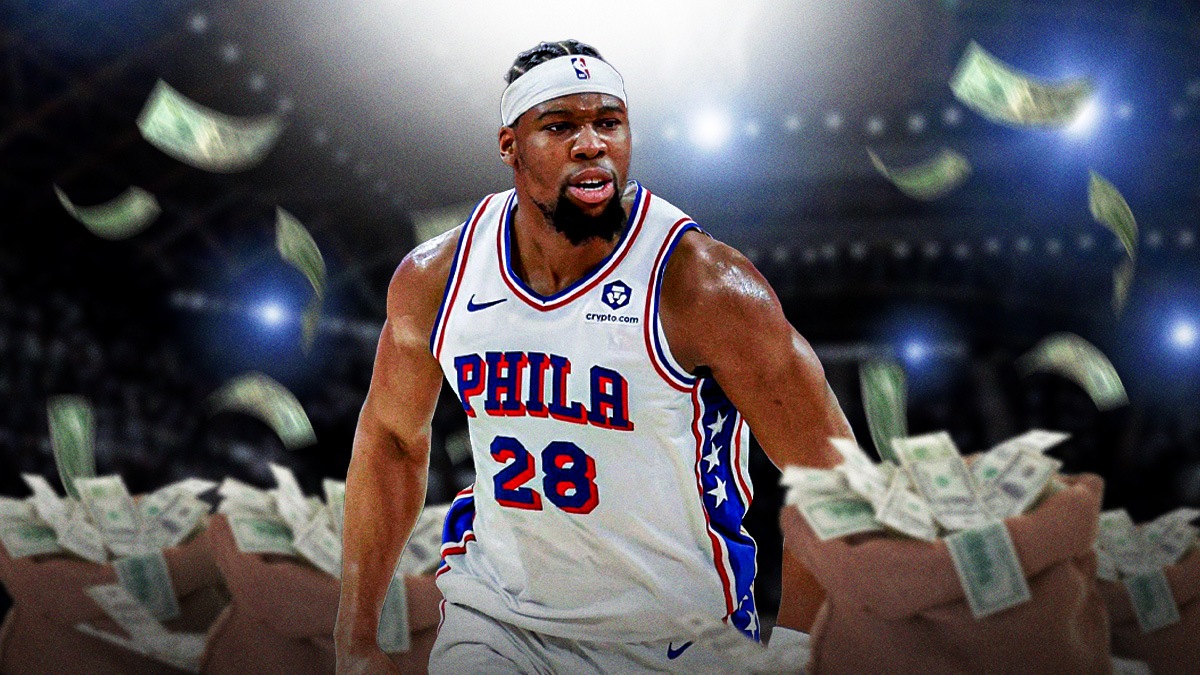 76ers' Guerschon Yabusele surrounded by money