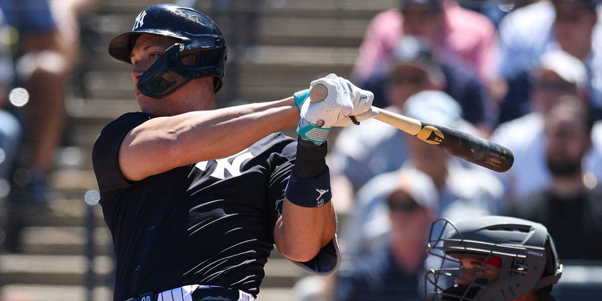  New York Yankees outfielder Aaron Judge (99) doubles against the Boston Red Sox in the fourth inning during spring training at George M. Steinbrenner Field. 