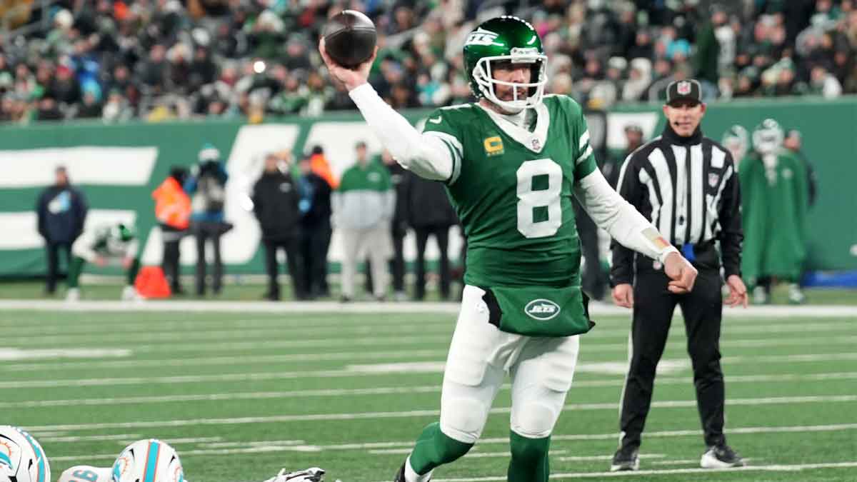 New York Jets quarterback Aaron Rodgers (8) throws his 500th career touchdown pass in the second quarter of the game against the Miami Dolphins on Jan. 5, 2025, in East Rutherford, N.J.