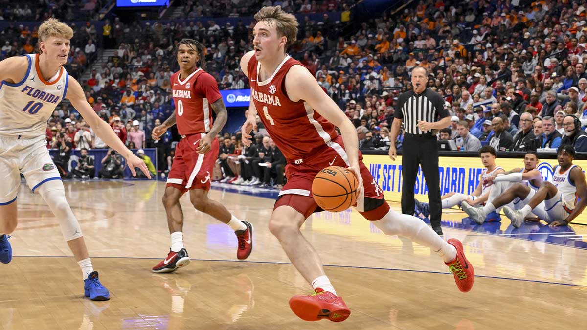 Alabama Crimson Tide forward Grant Nelson (4) drives to the basket against the Florida Gators during the first half at Bridgestone Arena.