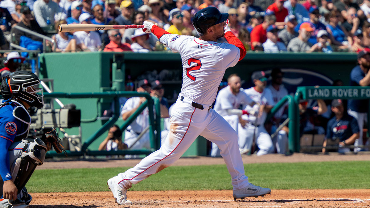 Boston Red Sox Alex Bregman (2) connects with the ball for a single during the first inning of their game with the New York Mets at JetBlue Park at Fenway South.