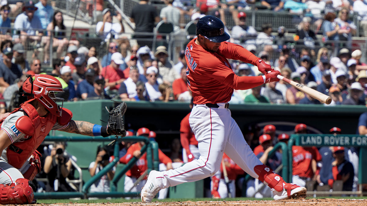 Boston Red Sox Alex Bregman (2) connects with the ball in the first inning of their game with the Phillies at JetBlue Park at Fenway South