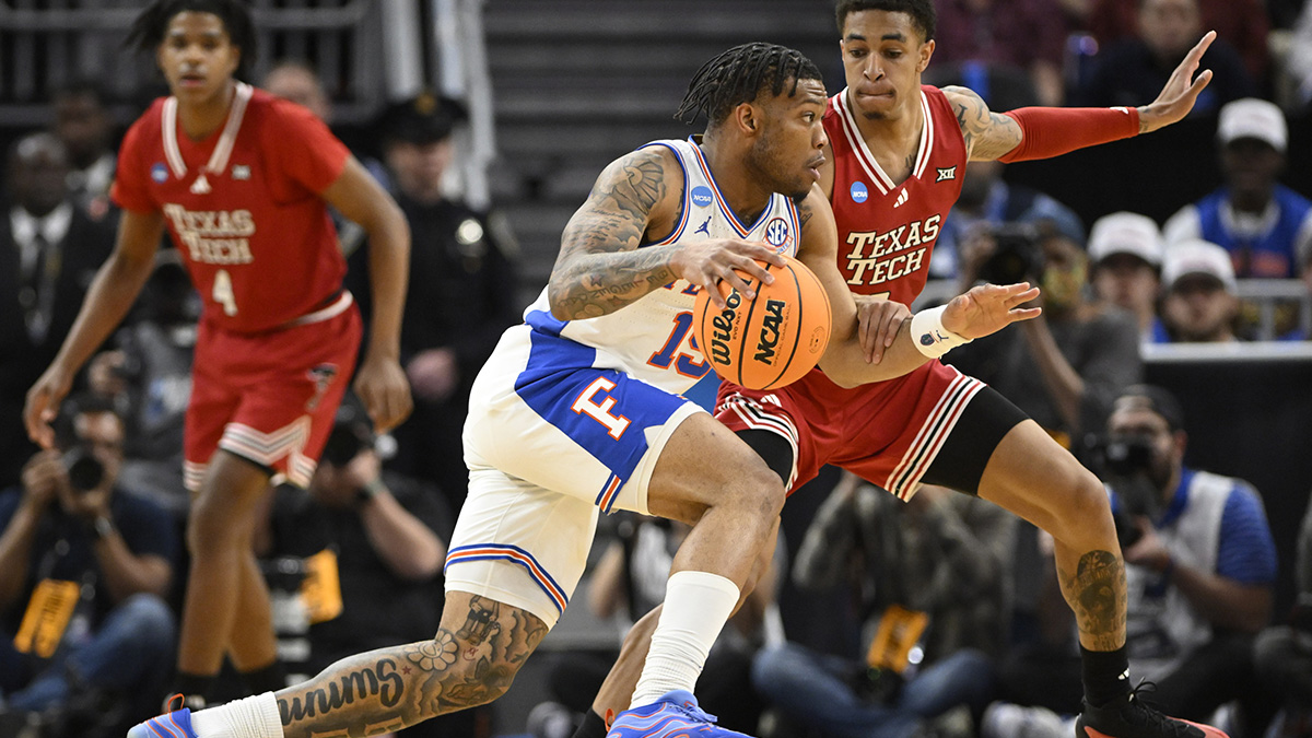 Florida Gators guard Alijah Martin (15) drives to the hoop past Texas Tech Red Raiders guard Chance McMillian (0) during the second half during the West Regional final of the 2025 NCAA tournament at Chase Center. Mandatory Credit: Eakin Howard-Imagn Images