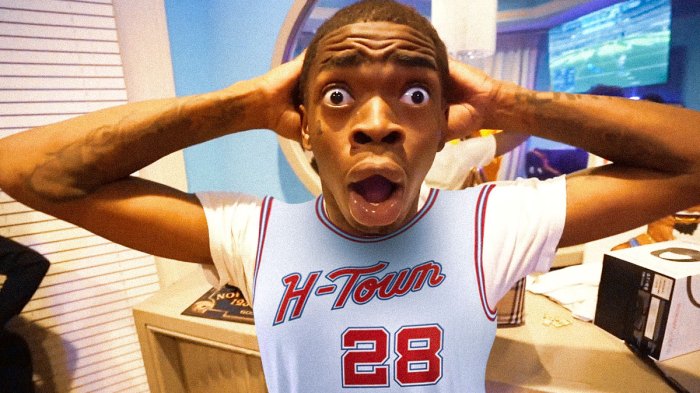 Shocked guy meme wearing HOUSTON ROCKETS jersey No. 28