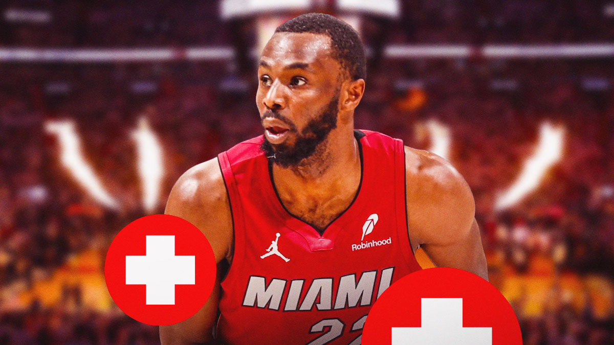 Miami Heat star Andrew Wiggins with injury signs around him in front of Kaseya Center.