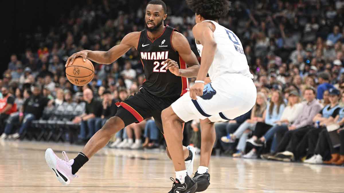 Miami Heat small forward Andrew Wiggins (22) drives past his defender Memphis Grizzlies forward Jalen Wells (0) in the second quarter of the game against the Memphis Grizzlies at FedExForum.