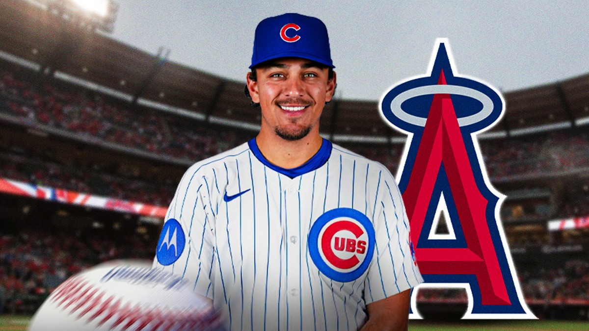 Nicky Lopez in front of a big Los Angeles Angels logo as the angels signed lopez following cubs release.