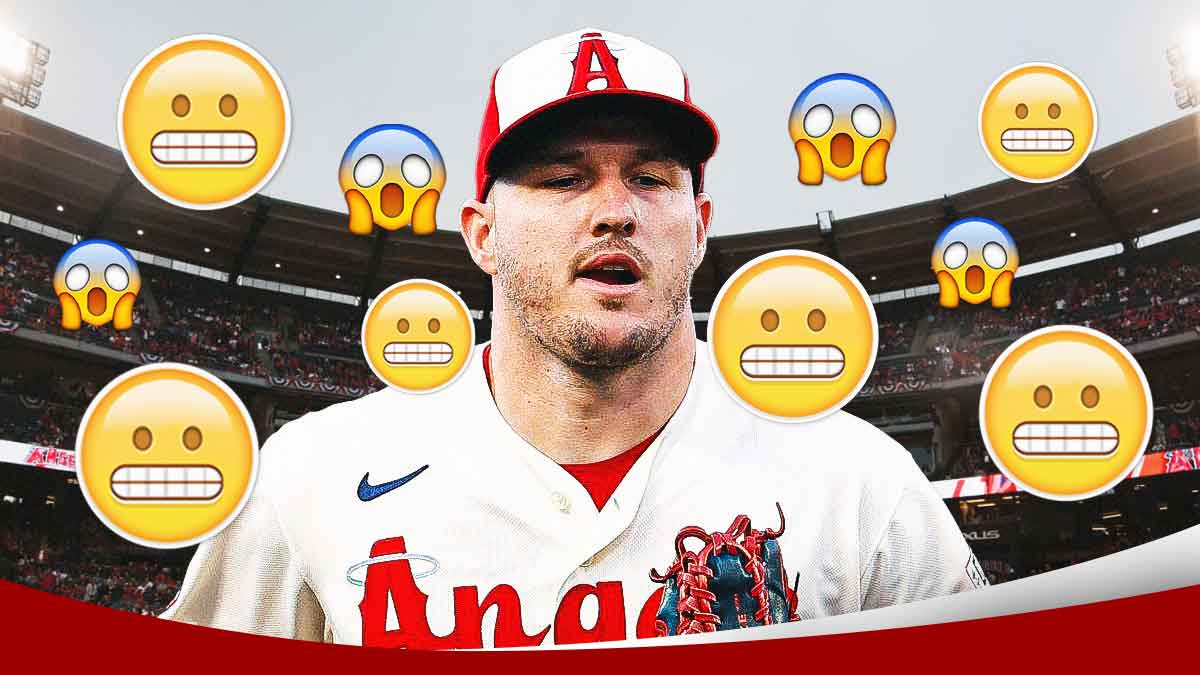 Mike Trout in a Los Angeles Angels uniform with face screaming in fear emojis and grimacing face emojis around as trout had an injury scare in first at bat.