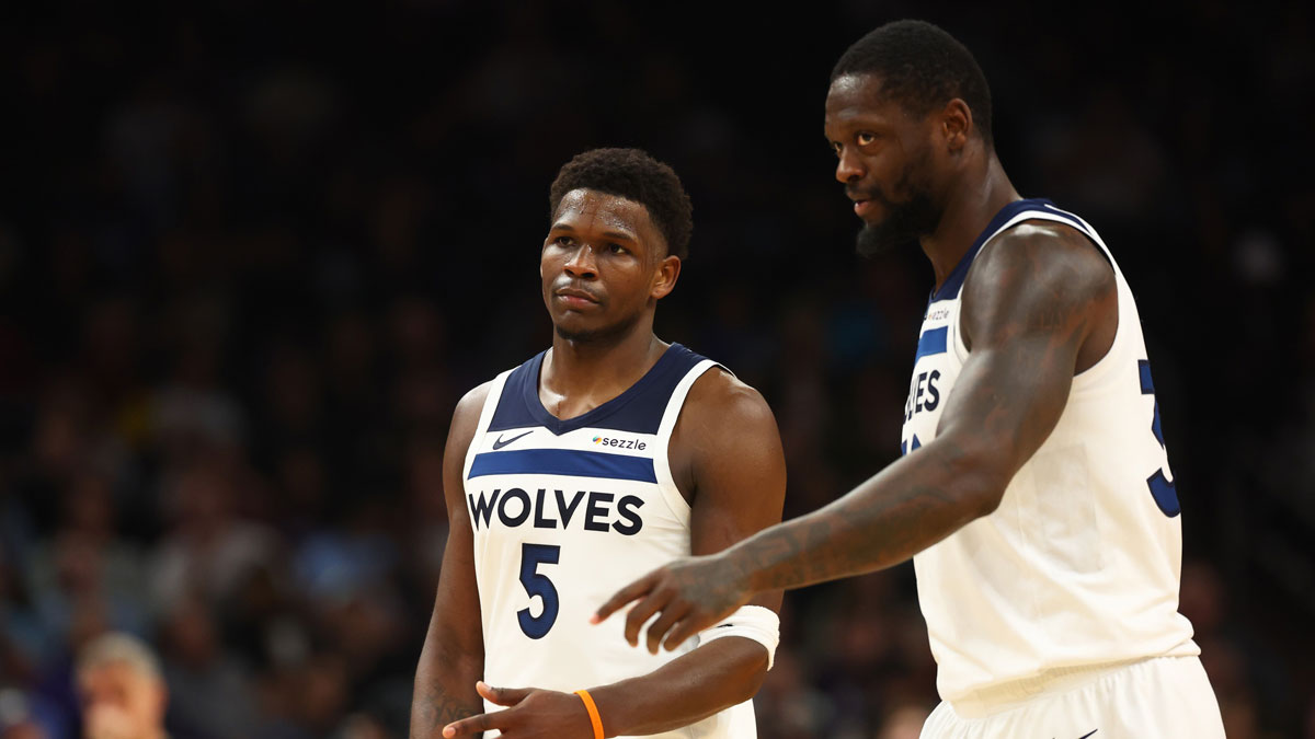 Minnesota Timberwolves guard Anthony Edwards (5) with forward Julius Randle (30) against the Phoenix Suns at Footprint Center. 