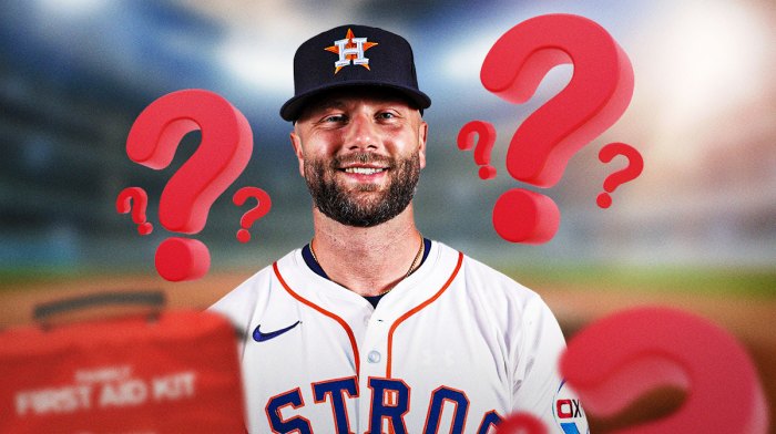 Christian Walker in a Astros jersey with question marks and first-aid kits around him