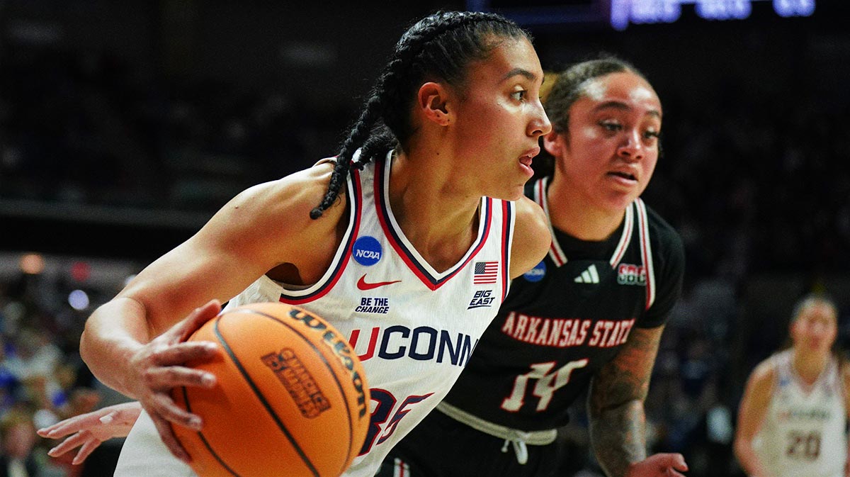UConn Huskies guard Azzi Fudd (35) drives the ball against Arkansas State Red Wolves guard Anna Griffin (14) in the first half at Harry A. Gampel Pavilion.