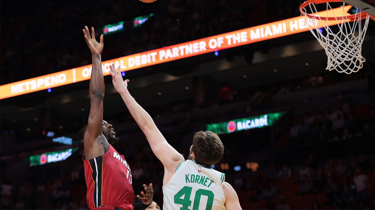     Miami Heat Bam Adebaiio (13) shoots in basketball nad Boston Celtictics Center Luke Kornet (40) During the first quarter in the center of Kasei.