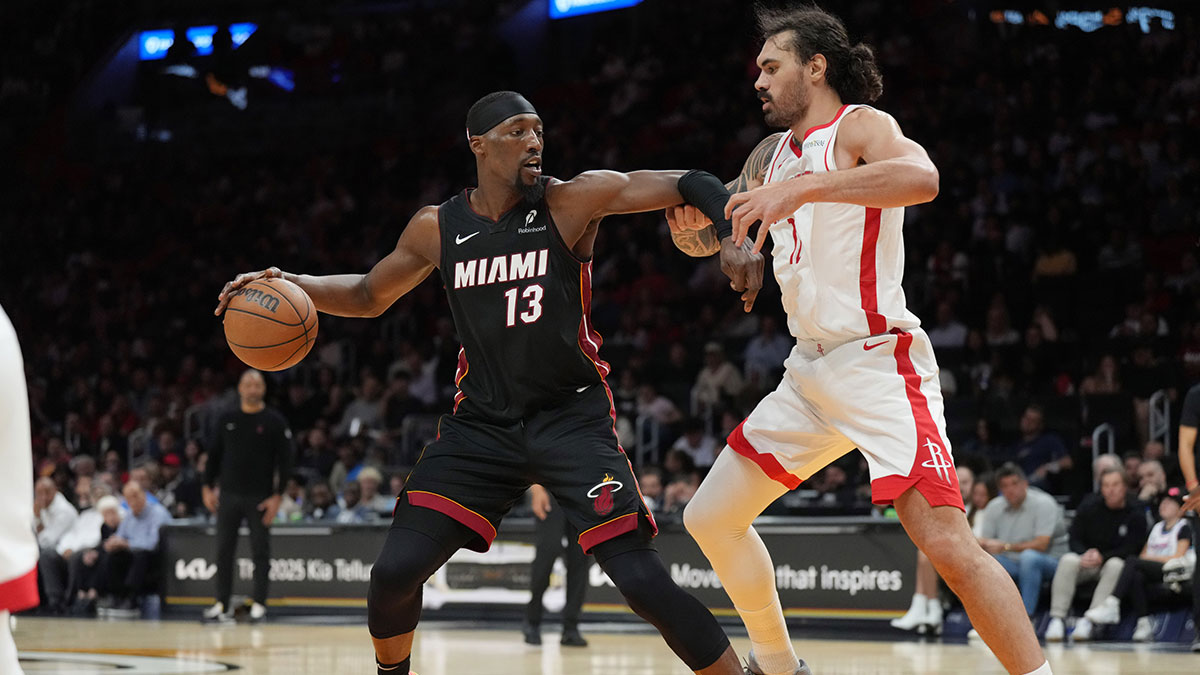 Miami Heat center Bam Adebayo (13) holds off Houston Rockets center Steven Adams (12) in the second half at Kaseya Center.