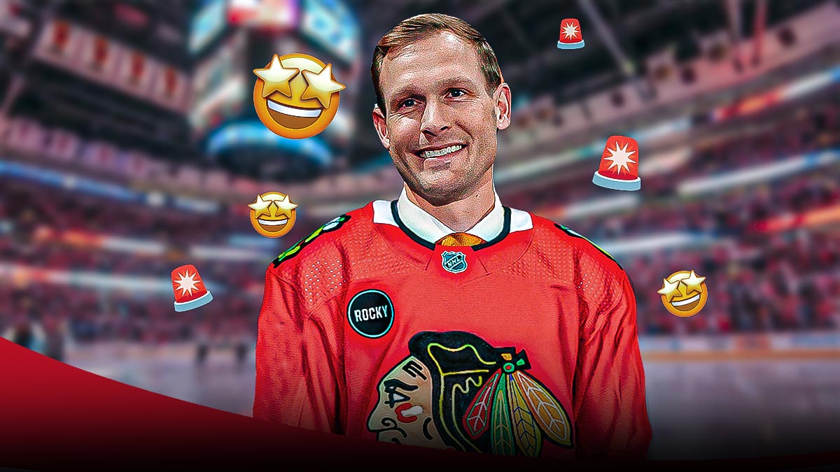 Bears HC Ben Johnson happy/smiling while wearing Chicago Blackhawks jersey with multiple 🚨 and 🤩 emojis in background. Background is United Center (Blackhawks arena).
