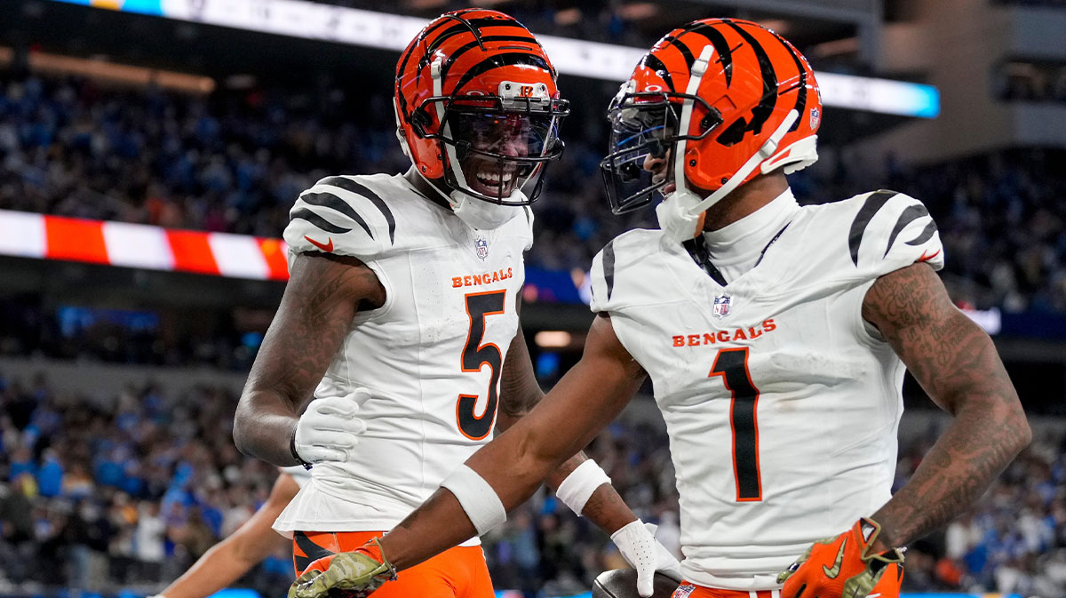 Cincinnati Bengals wide receivers Tee Higgins (5) and Ja'Marr Chase (1) celebrate a touchdown during a game on Nov. 17, 2024.