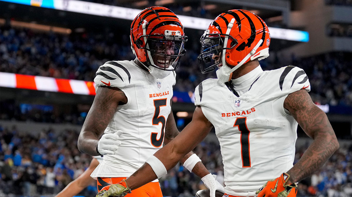 Cincinnati Bengals wide receivers Tee Higgins (5) and Ja'Marr Chase (1) celebrate a touchdown